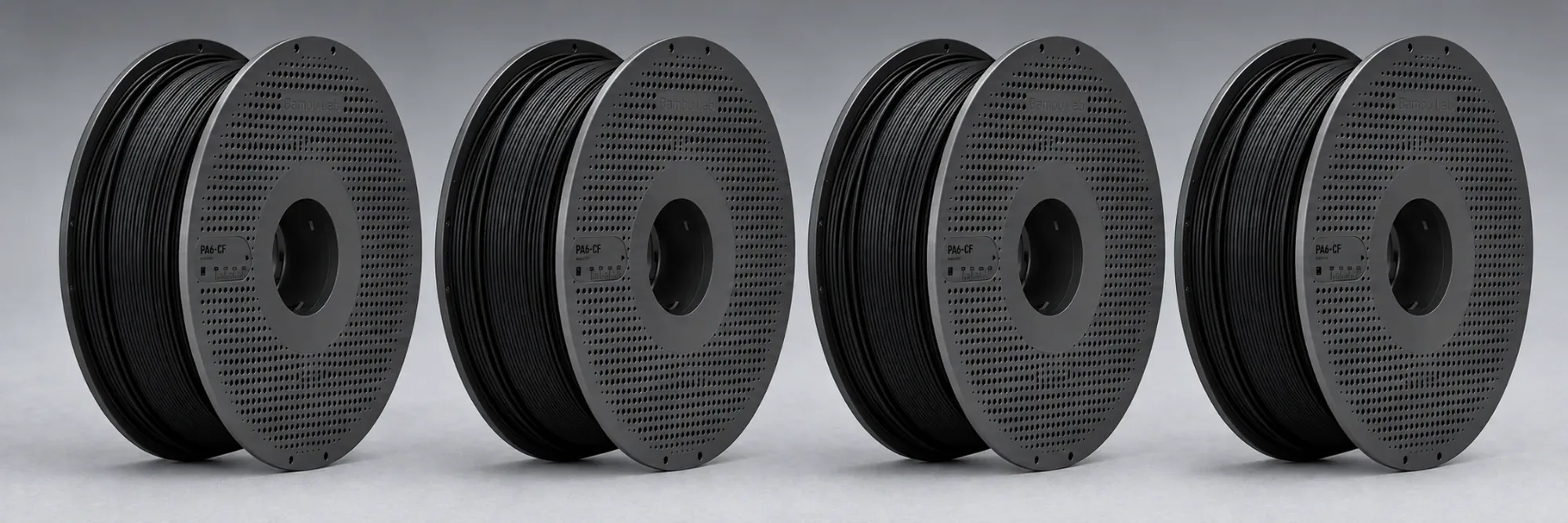 Spools of PA6-CF carbon fibre reinforced nylon filament used for engineering-grade 3D printed parts